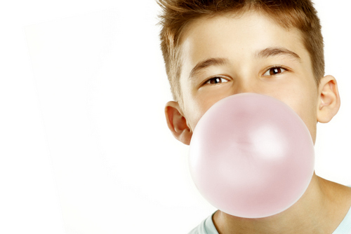 boy chewing bubble gum